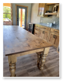 Custom built dining table in the Classic Farmhouse style built by Cattle Bend Woodworks.